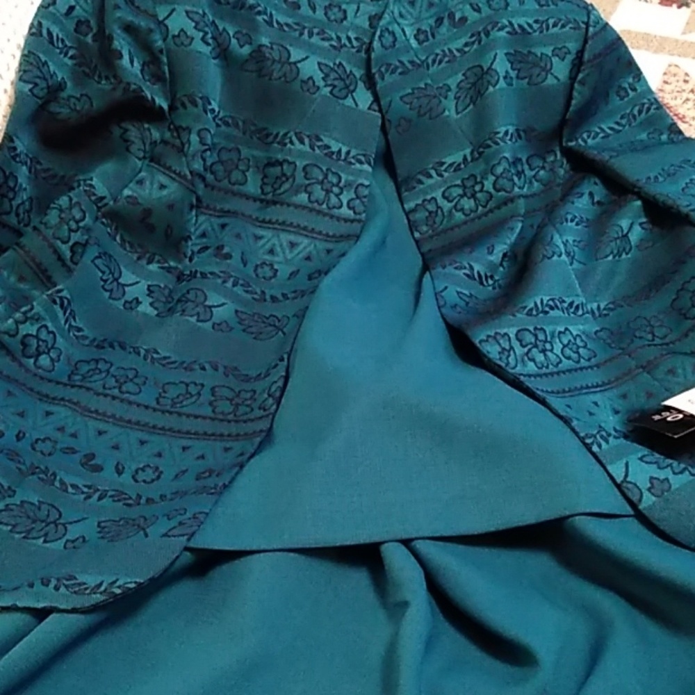 Three piece suit with tags